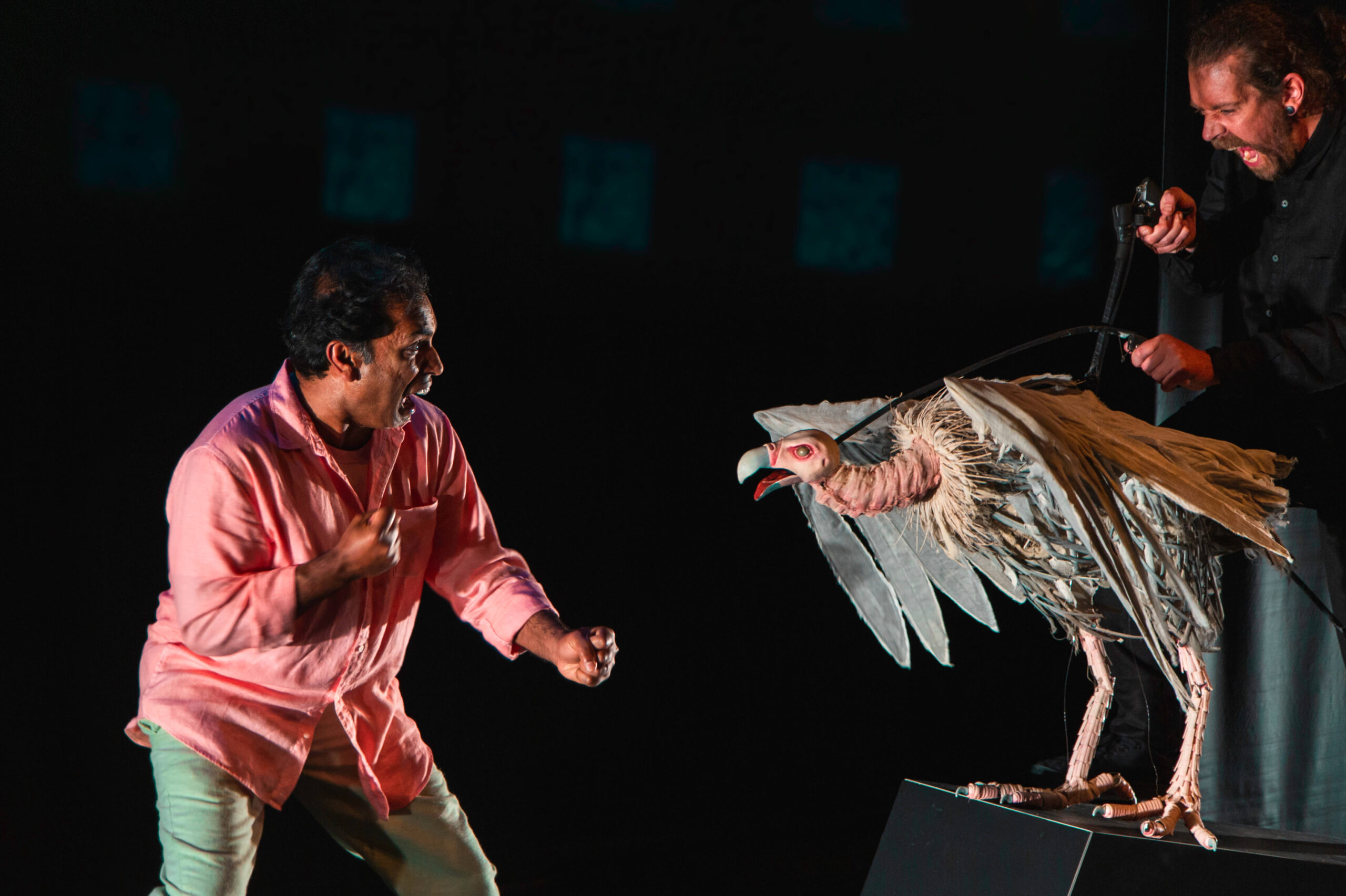 Man being chased by puppet vulture